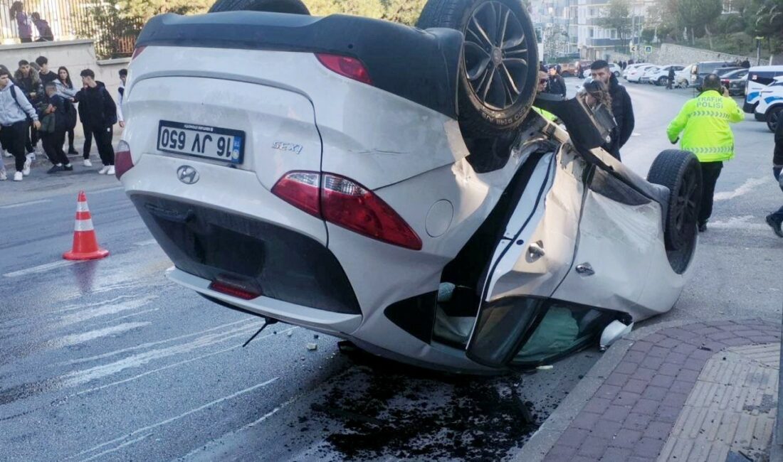 BURSA'DA KAFA KAFAYA ÇARPIŞAN OTOMOBİLLERDEN BİRİ TAKLA ATARAK DURABİLDİ. TAKLA