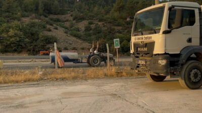 Bursa’nın Harmancık ilçesinde çıkan orman yangınına beton pompasıyla müdahale eden