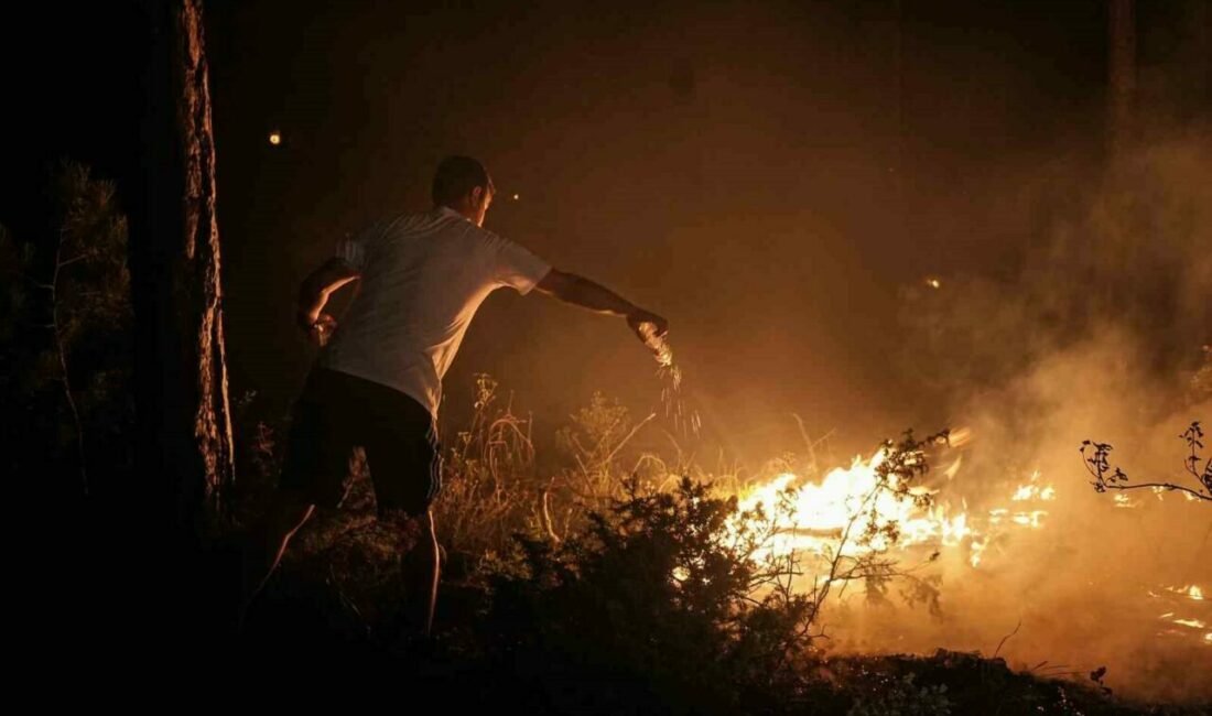 Pet şişelerle alevlere karşı mücadele Orhaneli ile Harmancık ilçeleri arasında çıkan orman yangınında ulaşılması güç